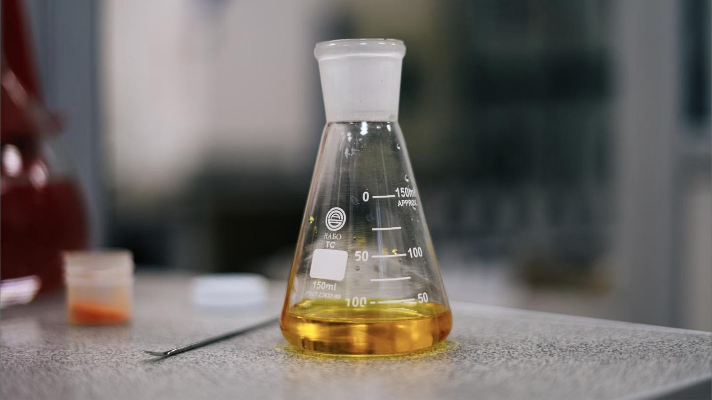 Precision oil blending sample in laboratory glassware