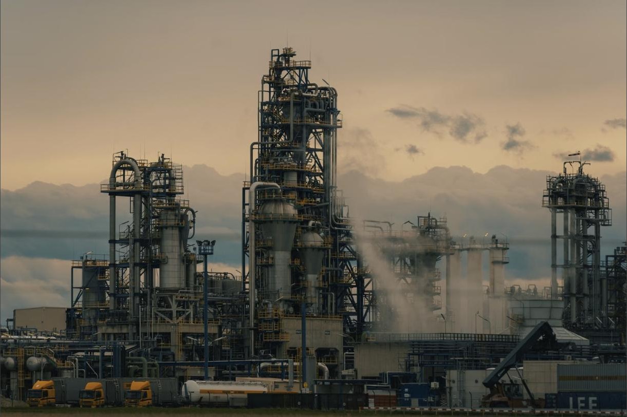Petrochemical refining towers at dusk